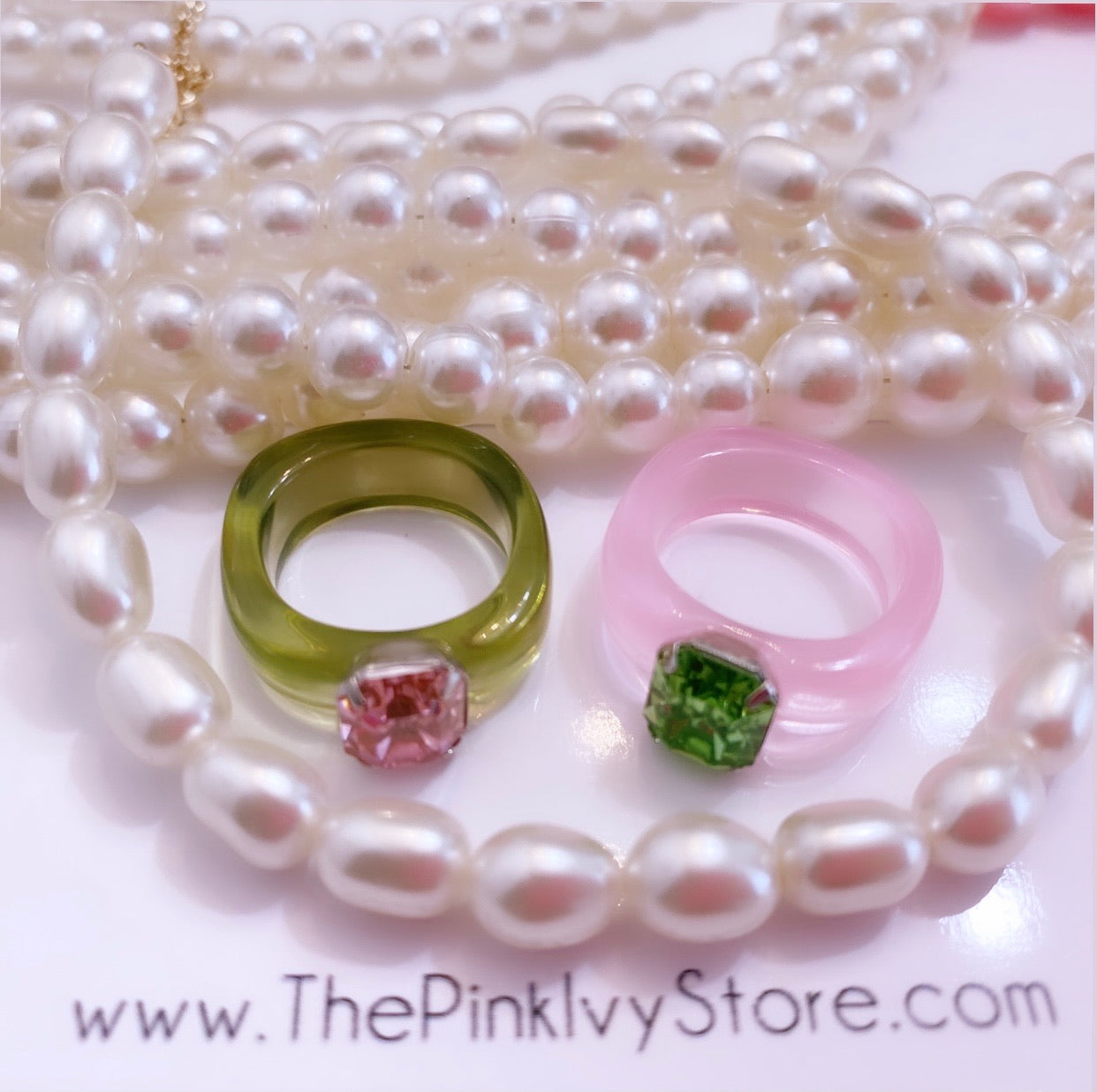 Pink and green AKA rings available online at the Chic Greek.