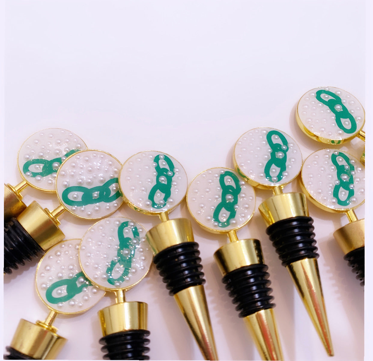 Alpha Kappa Alpha Sorority wine stoppers decorated with pearls. Perfect for home and kitchen décor.