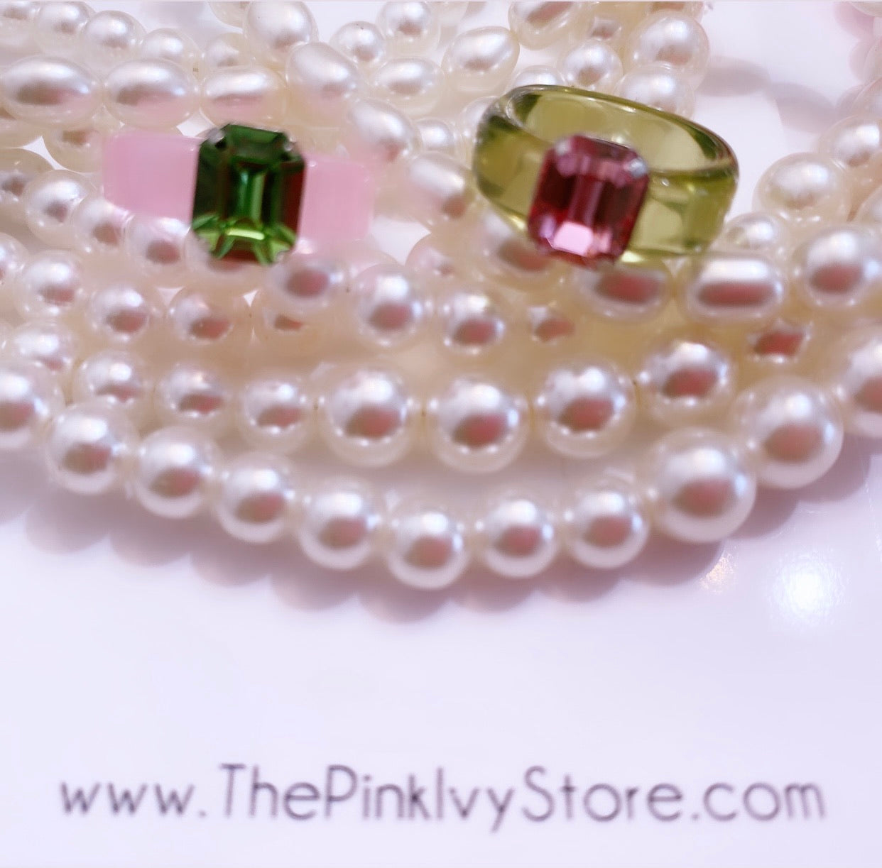 Set of pink and green acrylics banks with pink and green gems