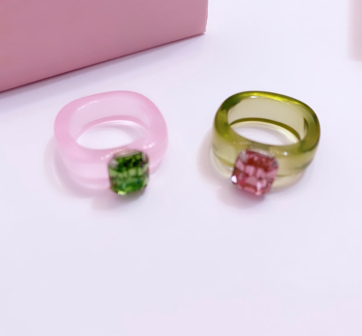 Sorority inspired pink and green acrylic rings with pink and green gems. 